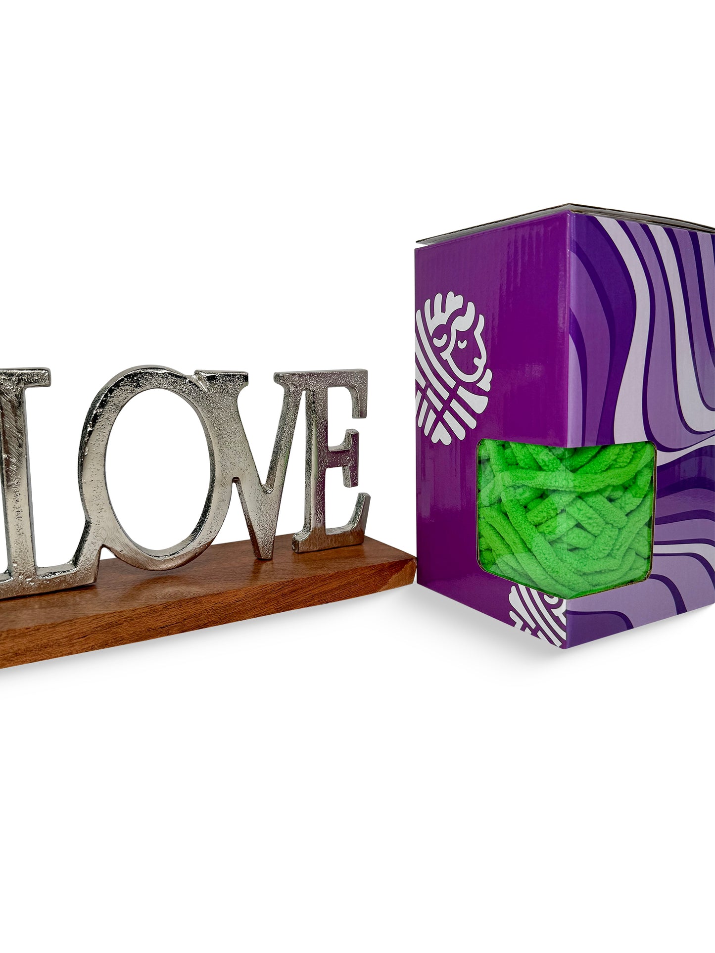 Green Spring Touch, a fresh green super bulky chenille yarn skeins neatly arranged inside a box, perfect for large crochet and knitting projects