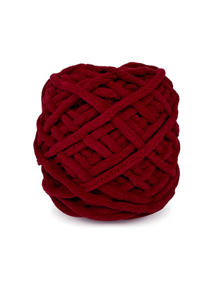 Close-up of Craftytop Ruby Romance, a romantic ruby red chenille yarn skein, highlighting its soft texture and plush fibers