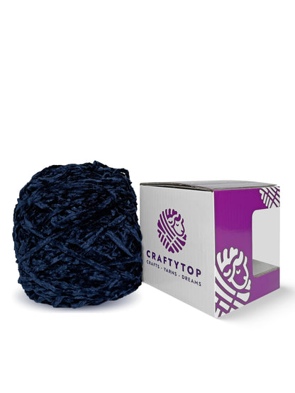 Craftytop navy blue yarn skein next to branded box – Starless Night Sky